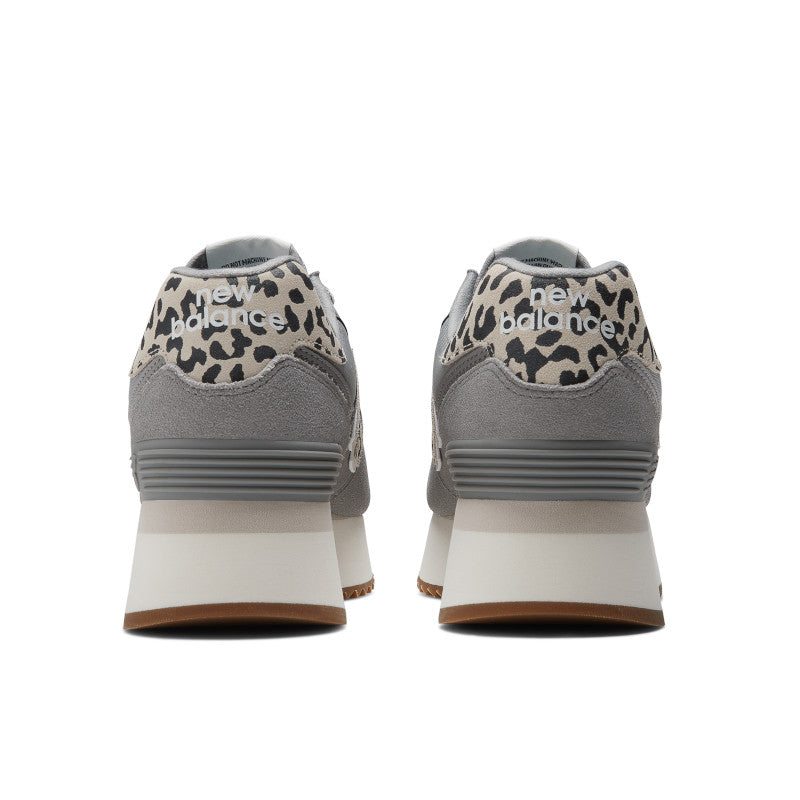 Rear view of womens lifesryle 574 stack shoe in grey with cheetah print