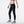 Side  view of the NB Women's Impact Run Legging in Black
