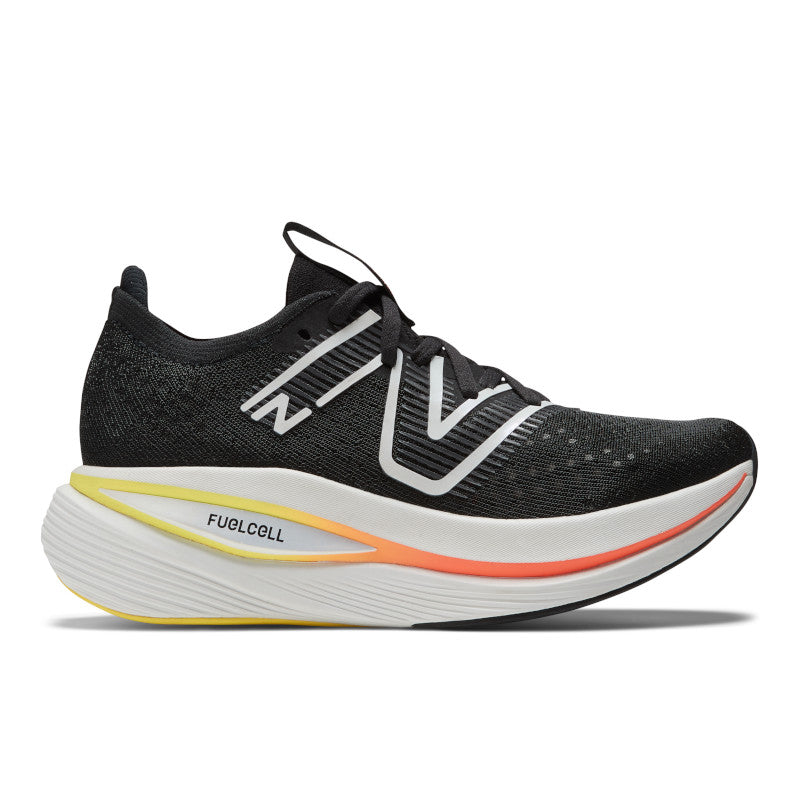 Lateral view of the Women's Fuel Cell SuperComp Trainer by New Balance in Black