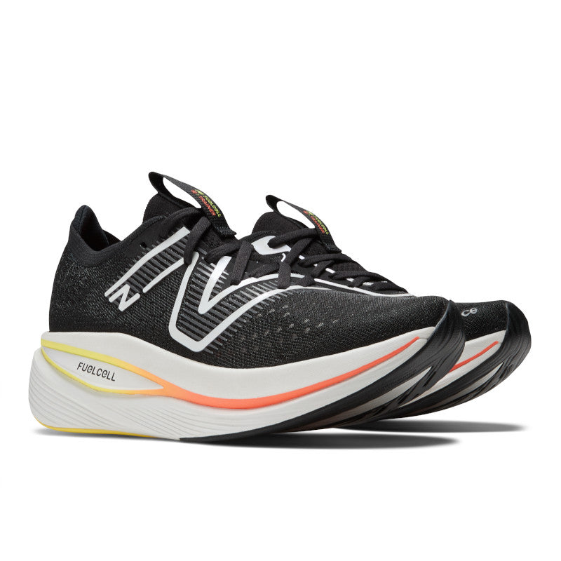 Front angled view of the Women's Fuel Cell SuperComp Trainer by New Balance in Black