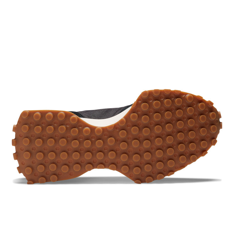 The outsole of this women's 327 is gum rubber with circluar dots for traction