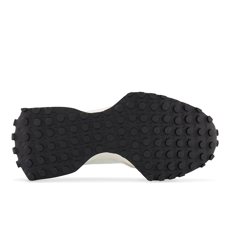 The outsole of the 327 has a unique adn simply round tread pattern