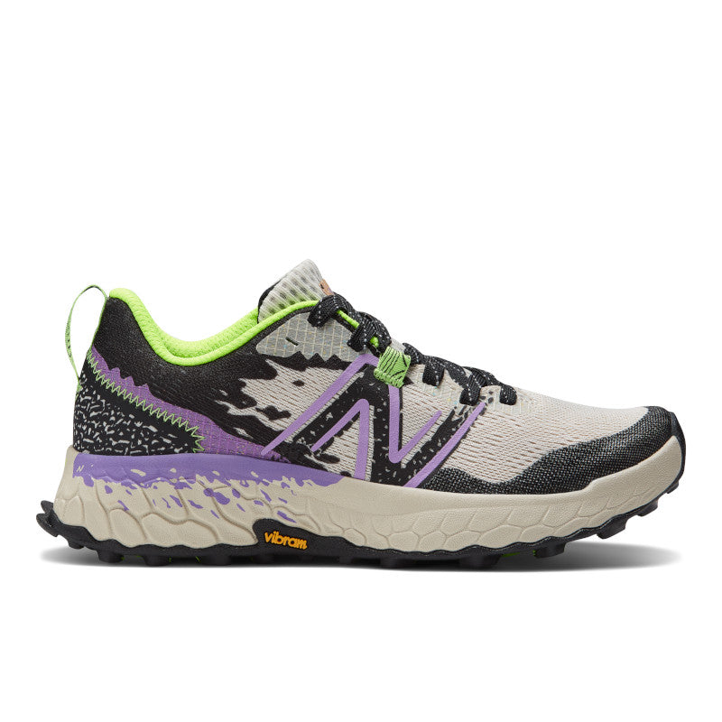 Lateral view of the Women's Hierro V7 trail shoe by New Balance in the color Moonbeam
