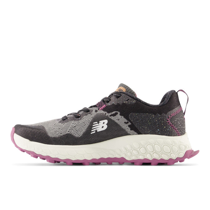 Medial view of the Women's Hierro V7 Trail shoe by New Balance in the color Castlerock with raisin