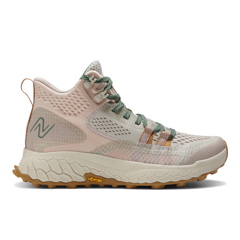 Lateral view of the Women's Fresh Foam X Hierro Mid trail shoe by New Balance in the color Timberwolf / Dusted Clay